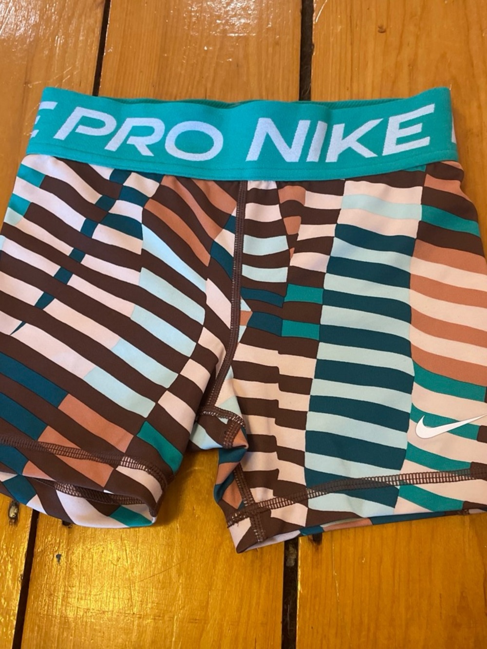 Nike Kids Striped Athletic Shorts in Teal, Brown & Light Blue